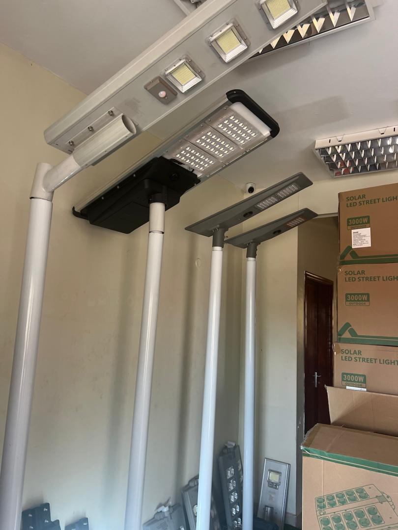 Solar streetlight fixtures and poles